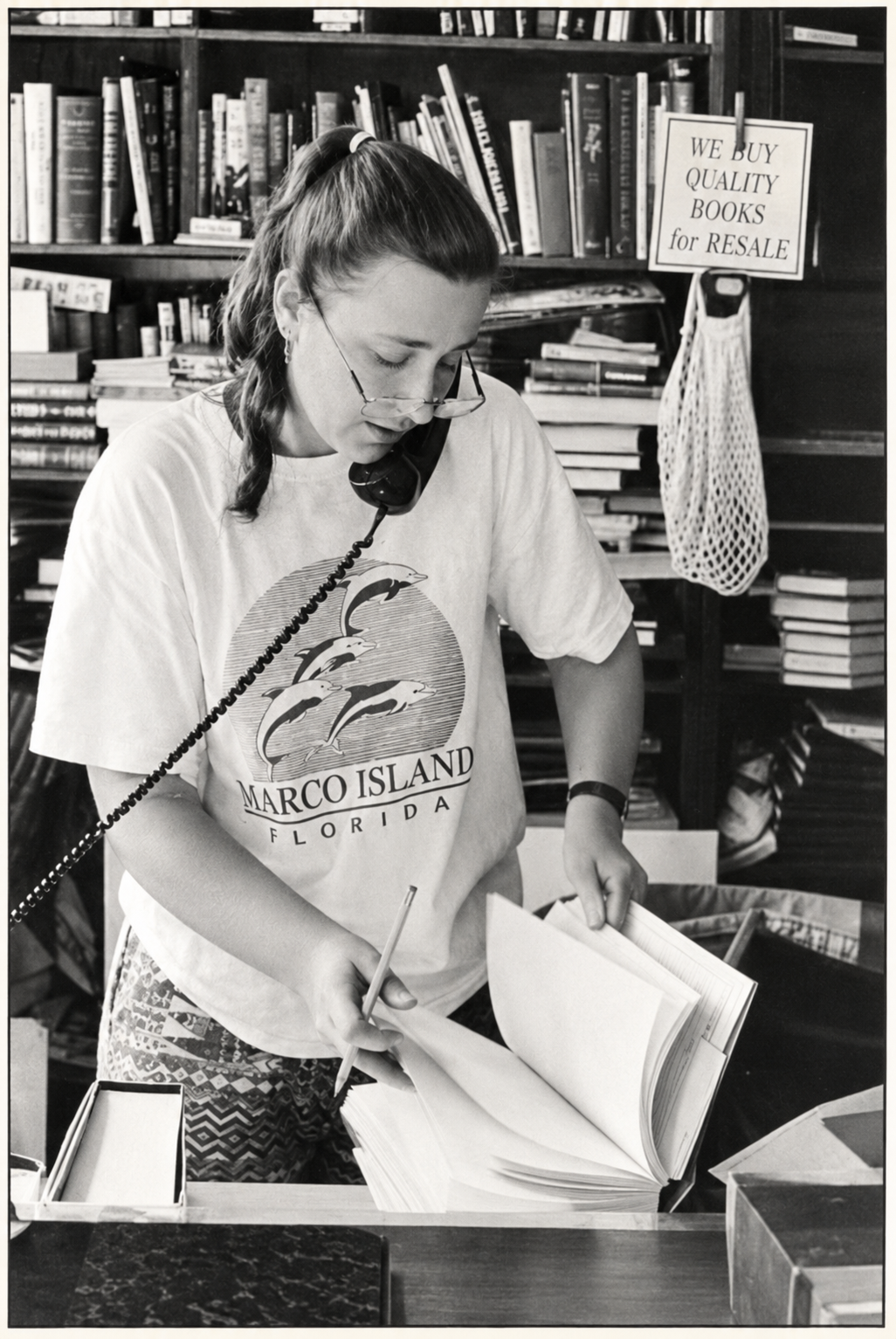 Joy Saunders working among books at Old Favorites in Greenriver, Ontario, in the early 1980s